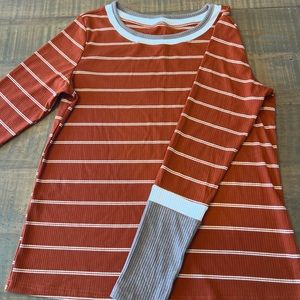 Women’s rust colored top